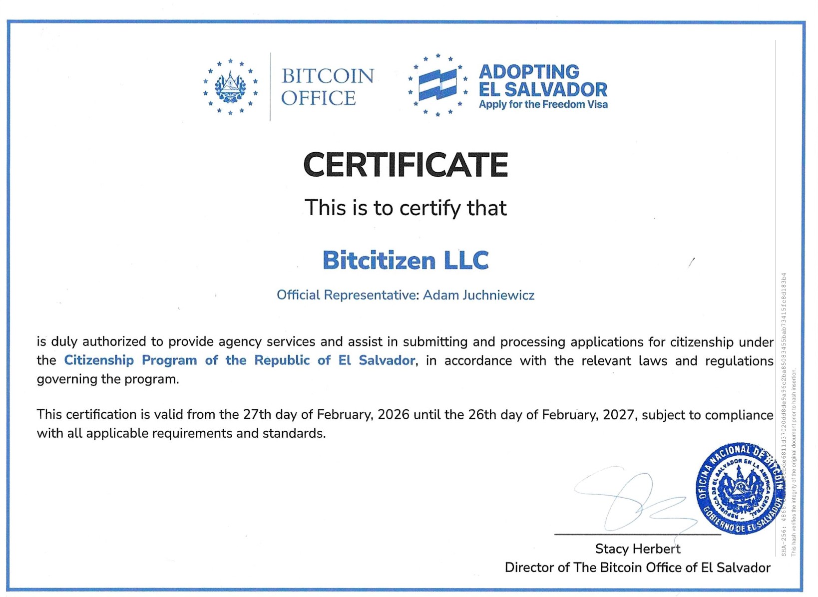 Certificate from The Bitcoin Office of El Salvador certifying Bitcitizen LLC, official representative Adam Juchniewicz, as duly authorized to provide agency services for the Citizenship Program of the Republic of El Salvador, valid February 2026 to February 2027, signed by Director Stacy Herbert.